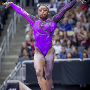 simone biles cringes on beam